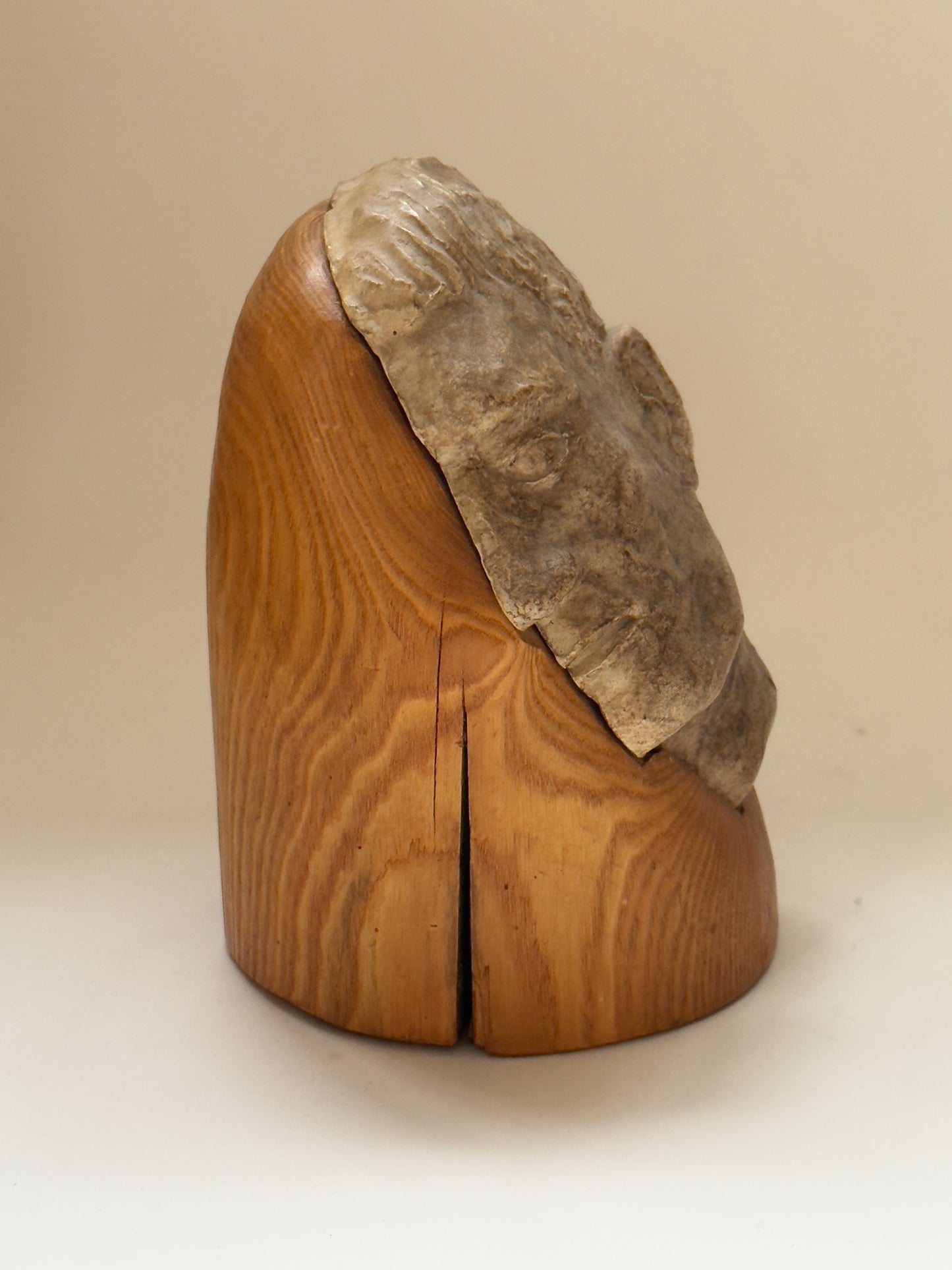 Face Sculpture on Wooden Pedestal
