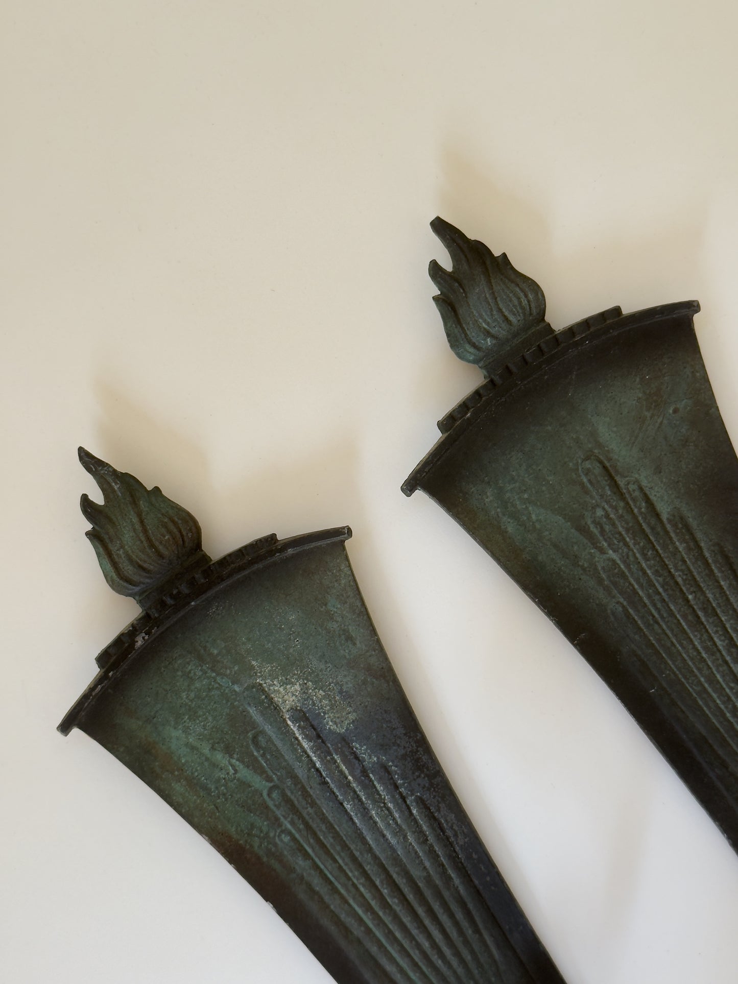 A Pair of Art Deco Bronze Candle Sconces