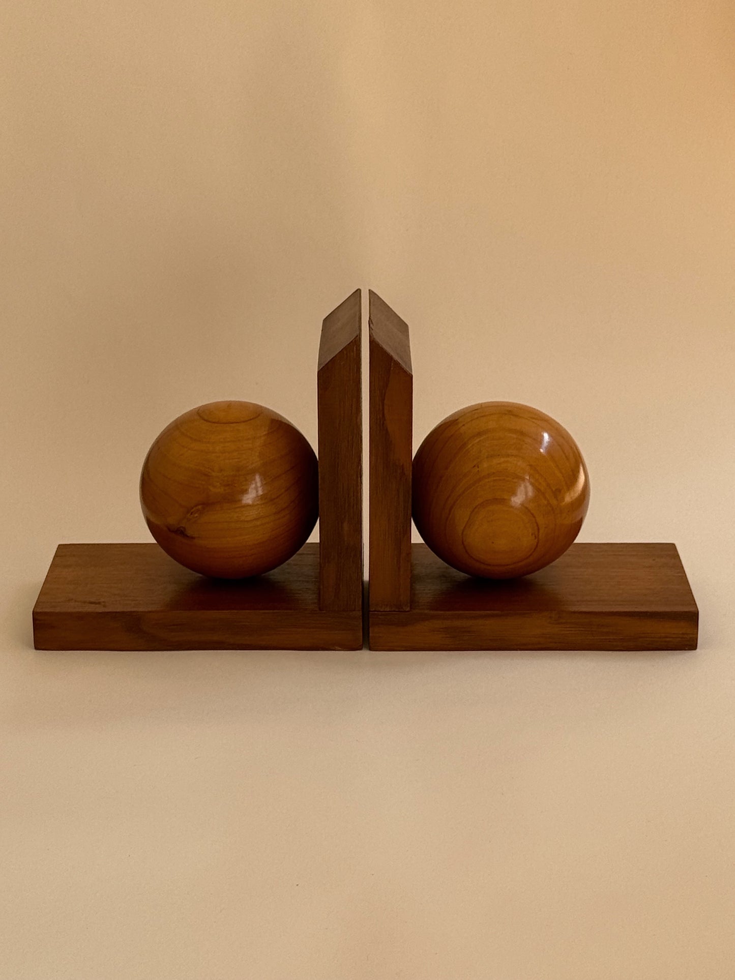 Pair of Mid-Century Wooden Bookends with Sculptural Spheres