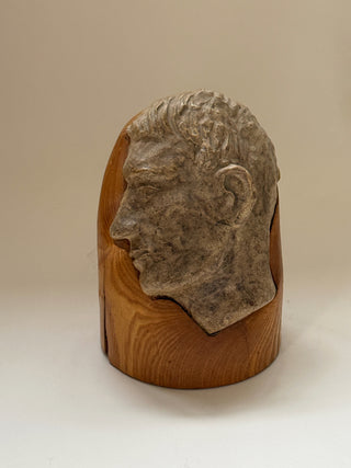 Face Sculpture on Wooden Pedestal