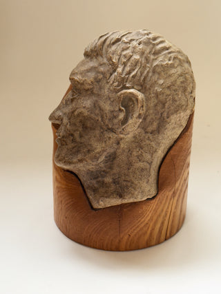 Face Sculpture on Wooden Pedestal