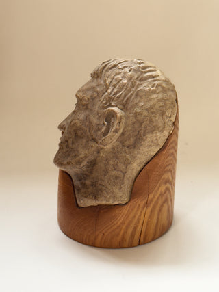 Face Sculpture on Wooden Pedestal