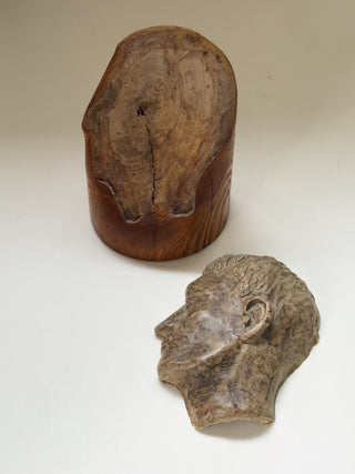 Face Sculpture on Wooden Pedestal